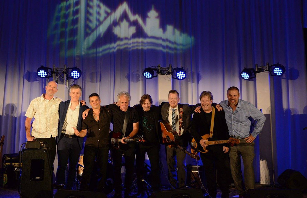 Sons of Stanley group photo on stage